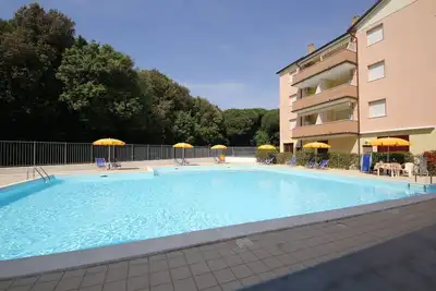 Image de Bel appartement de 3 pièces à Rosolina avec piscine partagée