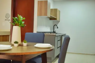 Image de Central and Comfortable Apartment 101
