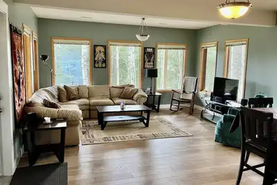2 Minutes to Kananaskis! Beautifully Furnished 1640 sq ft Suite on Acreage.