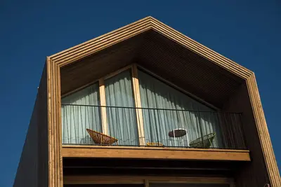 Image de Wooden duplex cabin with panoramic sea views.
