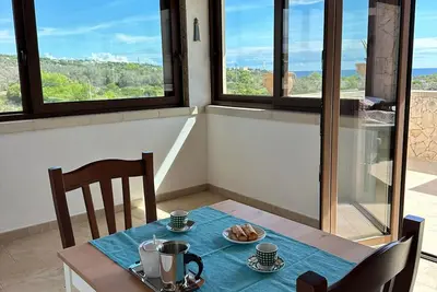 Image de Villa 'L'attico' avec vue sur la mer, terrasse privée et Wi-Fi