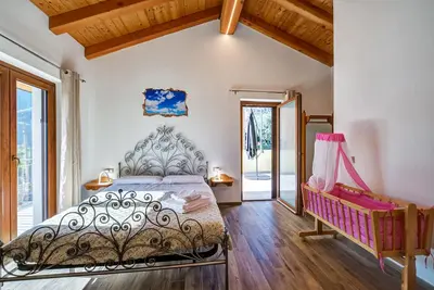Image de Chambre 'Zaffiro' avec vue sur les montagnes et Wi-Fi