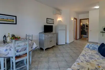 Image de Confortable appartement pour 4 personnes avec Wifi, climatisation, piscine, Tv et animaux admis
