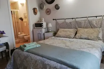 Image de Chambre 'Provenzale' avec jardin partagé, Wi-Fi et climatisation