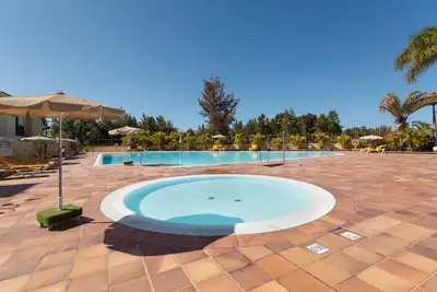 Image de Maison de vacances 'Sunset Meloneras' avec piscine partagée, Wi-Fi et climatisation