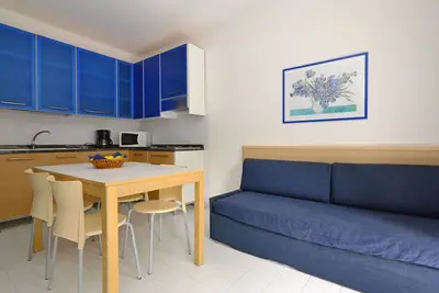 Image de Confortable appartement avec piscine, climatisation, Wifi, Tv, balcon, animaux admis et parking