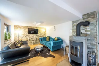 Image de Vacation home Fischen in the Allgäu with wellness for up to 14 people