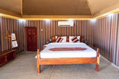 Image de Experience Wahiba in the comfort of our Premium Tents at Thousand Nights Camp