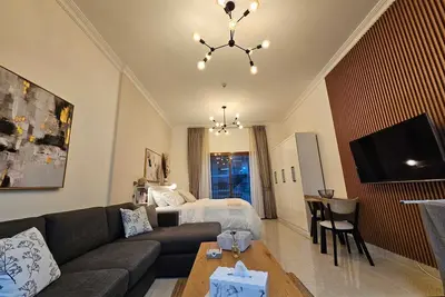 Image de Spacious studio apartment in Jvc Dubai near Circle mall with pool, gym, WiFi, Ac