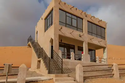 Image de Immerse in ultimate desert elegance with the Sand Suite at Thousand Nights Camp