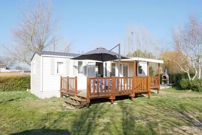 Image de Mobil-home cosy, 3 chambres, proche plage, jardin fermé, Bbq, animaux admis
