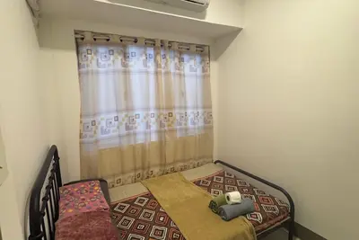 Image de Cozy 1-bedroom condo with Ac and WiFi in welcoming Mandaluyong
