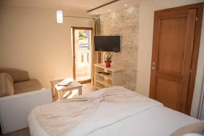 Image de Appartement au rez-de-chaussée, plage privée et vue mer