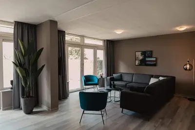 Image de Semi–detached bungalow for 10 people with a sauna