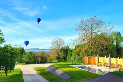 Image de Séchoir à tabac rénové façon loft avec piscine privée chauffée proche Sarlat