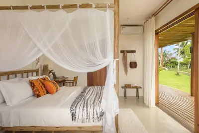 Image de Casa Betânia - right on the sand between the lagoon and the sea of Cassange