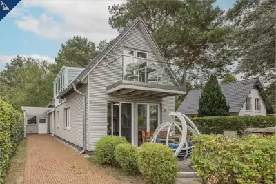 Image de Ferienhaus am Peenestrom - Beautiful vacation home with terrace and balcony on the
