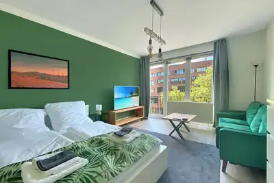 Image de Family apartment in the city, one stop from the main station with two balconies