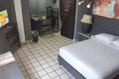 Image de Alojamiento cerca del aeropuerto con alberca