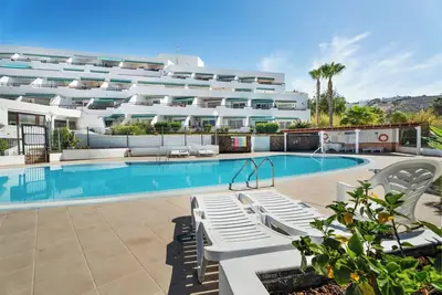 Image de Vacances 'Las Flores 1c' avec piscine partagée et Wi-Fi
