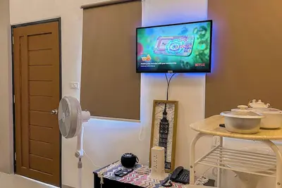 Chic 1-bedroom apartment in charming Cabanatuan City with WiFi, Ac