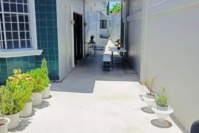 Image de Ella's Home Urdaneta City- 3 rooms, 2 bath, max 8 guests- Cold Ac, Free Wi-Fi