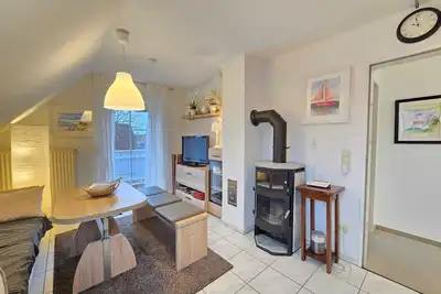 Image de Modern top-floor vacation apartment in Neßmersiel - relaxation by the North Sea