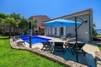 Image de Villa près de la plage avec vue sur la mer, 2 vélos, piscine privée chauffée - à seulement 300 mètres de la plage