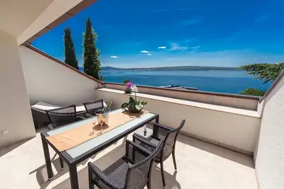 Image de Penthouse époustouflant en bord de mer avec vue sur la mer, 2 vélos, chauffage au sol, parking privé