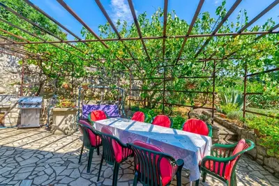 Image de Charmant appartement à seulement 250 mètres de la plage de sable avec terrasse privée, chaises longues, barbecue
