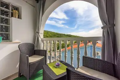 Image de Appartement confortable à 650 mètres de la plage avec vue sur la mer, parking privé, machine à laver.