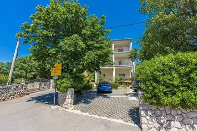 Image de Appartement rénové à seulement 600 mètres de la plage avec terrasse privée, barbecue, machine à laver