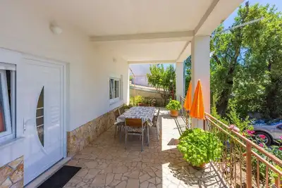 Image de Appartement moderne à seulement 600 mètres de la plage avec terrasse privée, barbecue, machine à laver