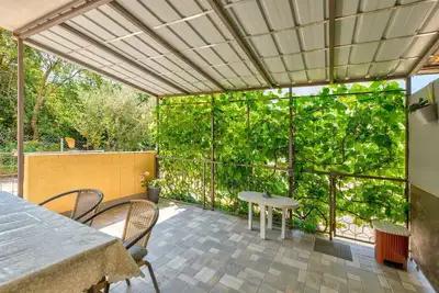 Image de Charmant appartement avec vue sur la mer, terrasse privée, protection solaire, machine à laver