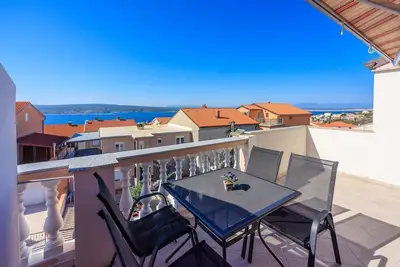Image de Appartement rénové avec terrasse sur le toit, vue sur la mer, parking privé, WiFi