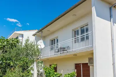 Image de Appartement confortable à seulement 430 mètres de la plage avec vue sur la mer, balcon, terrasse, espace barbecue