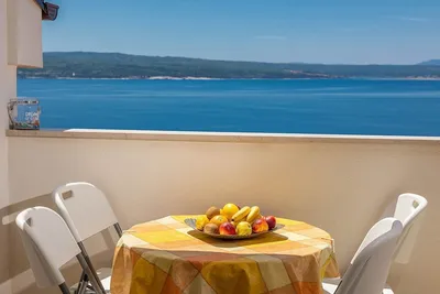 Image de Appartement lumineux à seulement 150 mètres de la plage avec terrasse sur le toit, vue sur la mer, barbecue