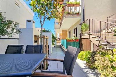 Image de Appartement adapté aux chiens à seulement 600 mètres de la plage avec barbecue, terrasse privée, machine à laver