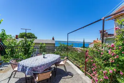 Image de Appartement rustique à seulement 500 mètres de la plage avec vue sur la mer, zone de barbecue, WiFi