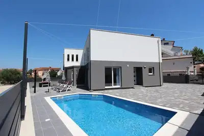 Image de Villa unique directement à Rovinj avec piscine privée, zone de barbecue, parking privé, WiFi