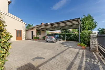 Image de Cozy appartement avec lit bébé, terrasse privée, parking privé, WiFi
