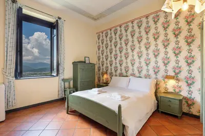 Image de Agriturismo « Chambre Quadruple Avec Vue sur le Vésuve » avec vue sur les montagnes, piscine commune et Wi-Fi