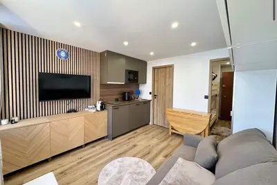 Image de Studio + coin montagne, neuf tout confort. Départ arrivé ski aux pieds