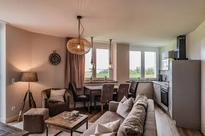 Image de Elbe view apartment D3 R2 - Balcony with Elbe view - Ferien auf Krautsand GmbH