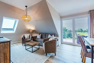 Image de Elbe view apartment D4 R2 - Balcony with Elbe view - Ferien auf Krautsand GmbH