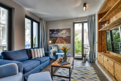 Image de Experience maritime charm in the Reetkoje vacation apartment with lake view in Binz.