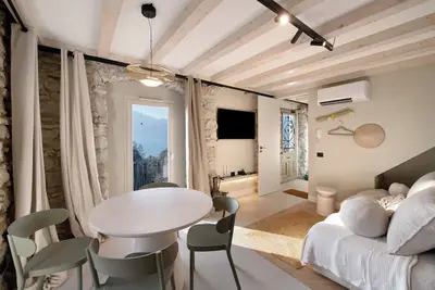 Image de Appartement Oliva (45 m2) avec terrasse commune, sauna et vue sur le lac