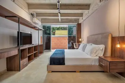 Image de Cozy loft with Ac and kitchenette with fast WiFi