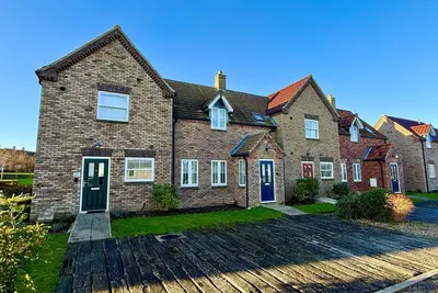 Image de Stunning 2 bed coastal cottage - Pool and Beach Access Included.