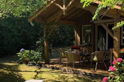 Image de Cap Ferret maison en bois de charme, accès direct à la plage par chemin privé.